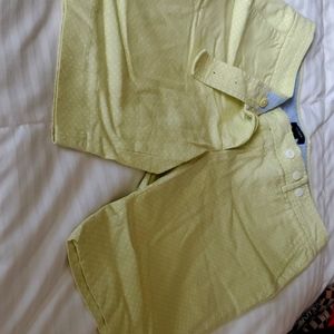 J Crew chartreuse shorts with white polka dots